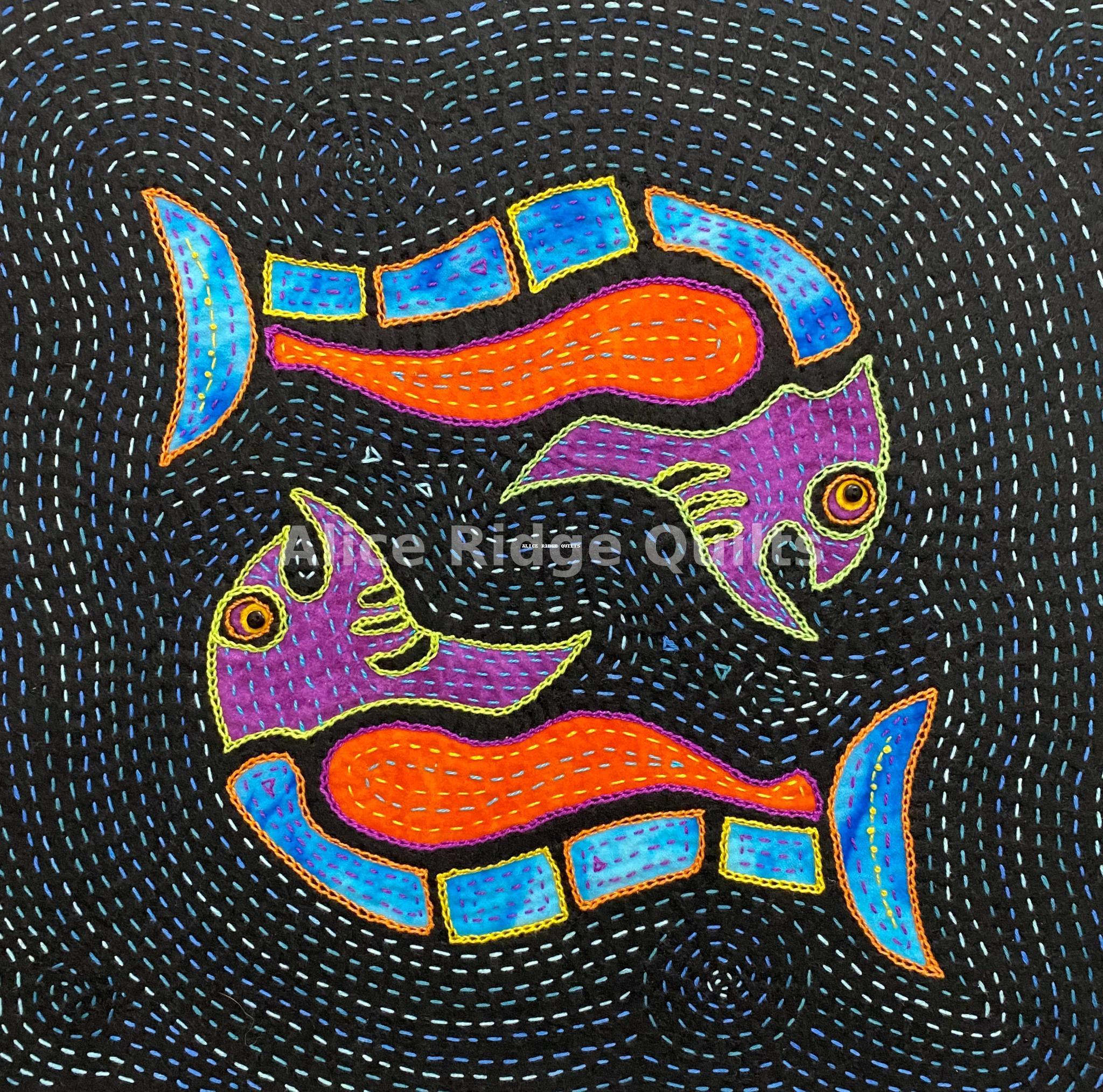 Colorful hand-stitched Mola quilt design featuring two abstract salmon in vibrant orange, purple, and blue hues against a swirling black background, inspired by Pacific Northwest art.